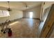 Large living room featuring tile floors and sliding glass door at 13026 Baltimore Woods Ln, Orlando, FL 32824
