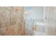 Bathroom with shower and soaking tub at 508 Bacio St, New Smyrna Beach, FL 32168