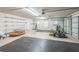 Spacious two-car garage with ample storage shelving and room for vehicles and equipment at 508 Bacio St, New Smyrna Beach, FL 32168
