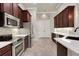 Spacious kitchen featuring stainless appliances, tile flooring, and ample counter space at 508 Bacio St, New Smyrna Beach, FL 32168