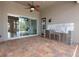 Covered patio with a built-in outdoor kitchen and access to an interior living space at 508 Bacio St, New Smyrna Beach, FL 32168