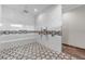 Luxurious walk-in shower with rainfall shower head, mosaic tile accents, and a built-in bench creating a spa-like retreat at 11657 Moore Rd, Lakeland, FL 33809