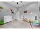 Stylish bedroom with dinosaur theme, offering space for fun and relaxation at 11657 Moore Rd, Lakeland, FL 33809