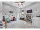 Large bedroom with vaulted ceiling, ceiling fan, and lots of space for play and rest at 11657 Moore Rd, Lakeland, FL 33809