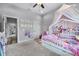 Adorable bedroom provides a cozy space with themed decor and a view of the outdoors at 11657 Moore Rd, Lakeland, FL 33809
