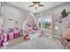 Charming bedroom offers lots of natural light and a ceiling fan at 11657 Moore Rd, Lakeland, FL 33809