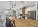 Bright kitchen with a large island, custom cabinetry, and stainless steel appliances at 11657 Moore Rd, Lakeland, FL 33809