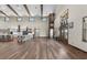 Large open living space features an open kitchen, beautiful floors and plenty of natural light at 11657 Moore Rd, Lakeland, FL 33809