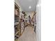 Spacious walk-in closet with custom shelves and hanging racks for optimal organization at 11657 Moore Rd, Lakeland, FL 33809