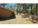 View of the backyard featuring a natural landscape with mature trees at 20045 Sw 88Th Place Rd, Dunnellon, FL 34431