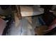 View of the Primary bedroom showing peeling concrete floor and debris at 20045 Sw 88Th Place Rd, Dunnellon, FL 34431