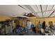 Garage showing cluttered storage, bicycles and damaged ceiling at 20045 Sw 88Th Place Rd, Dunnellon, FL 34431