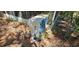 Outdoor HVAC system surrounded by plants and debris at 20045 Sw 88Th Place Rd, Dunnellon, FL 34431