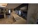 Open kitchen layout with countertop and views of the living area at 20045 Sw 88Th Place Rd, Dunnellon, FL 34431