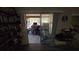 Living room with sliding glass door and backyard access at 20045 Sw 88Th Place Rd, Dunnellon, FL 34431