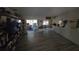Open-concept living room showcasing hardwood floors and sliding glass doors at 20045 Sw 88Th Place Rd, Dunnellon, FL 34431