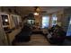 Living room with hardwood floors and an aquarium at 20045 Sw 88Th Place Rd, Dunnellon, FL 34431