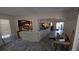 Living Room showing view into kitchen and through to the back yard at 20045 Sw 88Th Place Rd, Dunnellon, FL 34431
