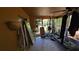 Sunroom with tile flooring and view to backyard at 20045 Sw 88Th Place Rd, Dunnellon, FL 34431