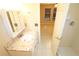 Bathroom with granite vanity and updated shower area at 2521 Tamarind Dr, Edgewater, FL 32141