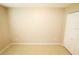 The bedroom features tile flooring and light tan walls, creating a cozy and inviting space at 2521 Tamarind Dr, Edgewater, FL 32141