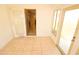 Enclosed sunroom features tiled floor and bright windows offering natural light at 2521 Tamarind Dr, Edgewater, FL 32141