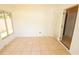 Sunroom has tile flooring and a sliding door that leads to the house at 2521 Tamarind Dr, Edgewater, FL 32141