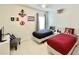 Bedroom featuring 2 twin beds, Americana decor and a comfortable gray armchair at 4500 Monado Dr, Kissimmee, FL 34746