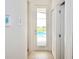 Bright hallway leading to the pool area, offering seamless indoor-outdoor living at 4500 Monado Dr, Kissimmee, FL 34746