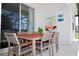 Outdoor patio with dining furniture, ideal for relaxing and entertaining guests at 4500 Monado Dr, Kissimmee, FL 34746