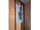 View of the home's electrical panel at 605 Maggie Cir, Winter Haven, FL 33880