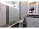 Bathroom with a shower, a toilet and a vanity at 1514 Corolla Ct, Reunion, FL 34747