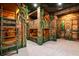 A unique bedroom with a jungle theme featuring custom bunk beds and detailed artificial vines at 1514 Corolla Ct, Reunion, FL 34747