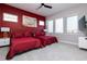 Bedroom featuring two beds and modern decor at 1514 Corolla Ct, Reunion, FL 34747