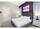 Cozy bedroom with a plush bed, stylish decor, and plenty of natural light at 1514 Corolla Ct, Reunion, FL 34747