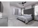 Bedroom with large bed, contemporary decor, and a ceiling fan at 1514 Corolla Ct, Reunion, FL 34747