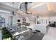 Open-concept design integrating the dining, living, and kitchen areas for seamless entertaining at 1514 Corolla Ct, Reunion, FL 34747