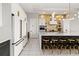Modern kitchen with stainless steel appliances, sleek cabinetry, and a large center island at 1514 Corolla Ct, Reunion, FL 34747