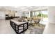 Open-concept living area connects the kitchen, dining, and living spaces at 1514 Corolla Ct, Reunion, FL 34747