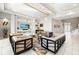 Spacious living room with modern decor, a large TV, and plenty of seating at 1514 Corolla Ct, Reunion, FL 34747