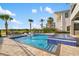 Enjoy a lovely pool, lounge chairs, and serene water feature perfect for outdoor entertaining and recreation at 1514 Corolla Ct, Reunion, FL 34747