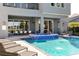 Inviting pool and patio area with an outdoor dining area and lounge chairs at 1514 Corolla Ct, Reunion, FL 34747