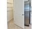 Walk-in pantry with wire shelving for ample storage space at 5216 Greenheart Ave, Mount Dora, FL 32757