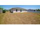 Large backyard offering ample space for outdoor activities and landscaping, enhancing privacy and enjoyment at 13257 Sw 29Th Cir, Ocala, FL 34473