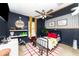Unique bedroom with bold decor, fan, and playful design accents, creating an imaginative space at 13257 Sw 29Th Cir, Ocala, FL 34473