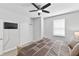 Comfortable bedroom featuring a ceiling fan and a simple design at 3153 Legends Preserve Dr, Daytona Beach, FL 32124