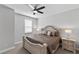 Inviting bedroom with a luxurious bed, side tables, and soft lighting for a cozy retreat at 3153 Legends Preserve Dr, Daytona Beach, FL 32124