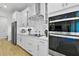 Bright kitchen showcases white cabinetry, stainless steel appliances, and modern design, perfect for culinary enthusiasts at 3153 Legends Preserve Dr, Daytona Beach, FL 32124