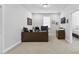 Office space featuring a large desk, comfortable chair, and natural light at 3153 Legends Preserve Dr, Daytona Beach, FL 32124
