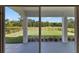 Beautiful view from the patio, overlooking a well-manicured lawn and golf course, enhancing outdoor living at 3153 Legends Preserve Dr, Daytona Beach, FL 32124